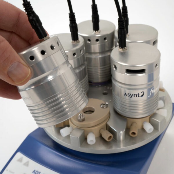 fReactor PhotoFLOW module being removed from the fReactor. Photochemistry in Flow Chemistry solution from Asynt